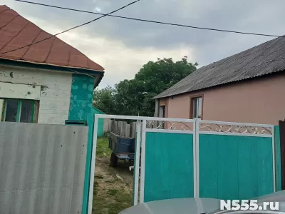 ПРОДАМ Шикарный участок в центре города с домом и гаражом .